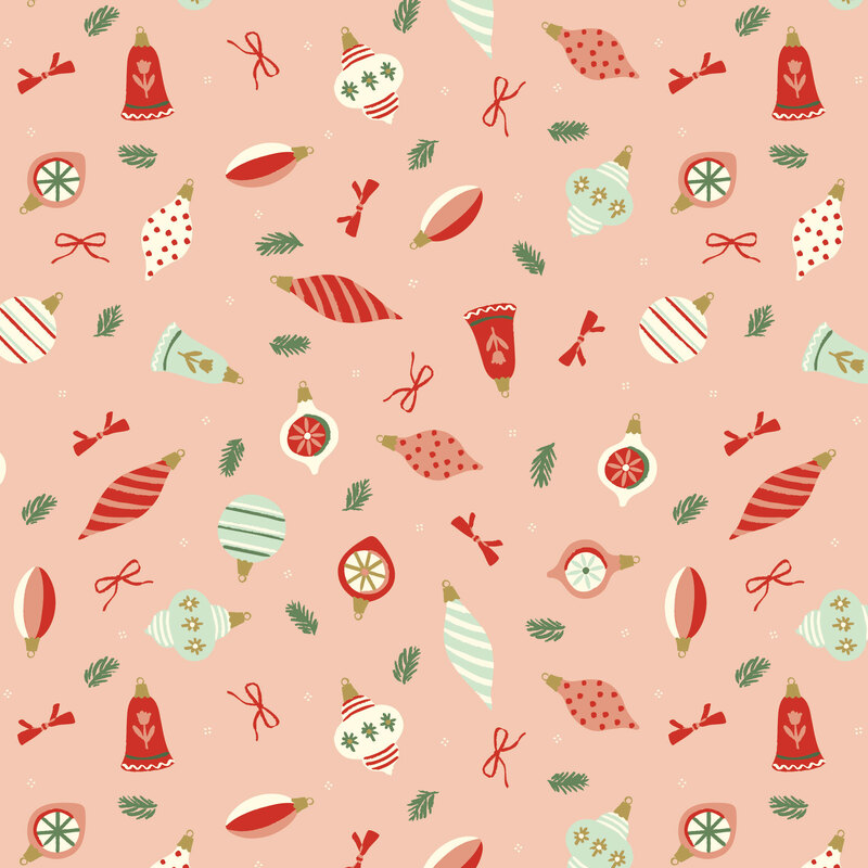 A peach fabric with scattered christmas ornaments, bows, ribbons, and leafy sprigs.