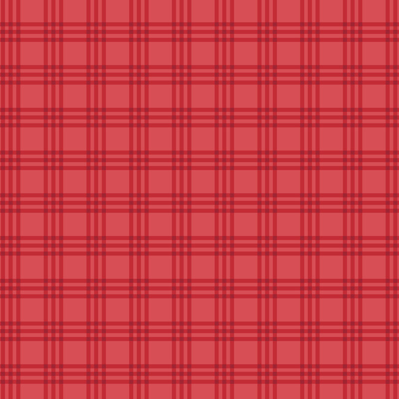 Christmas red fabric with a tonal plaid design.