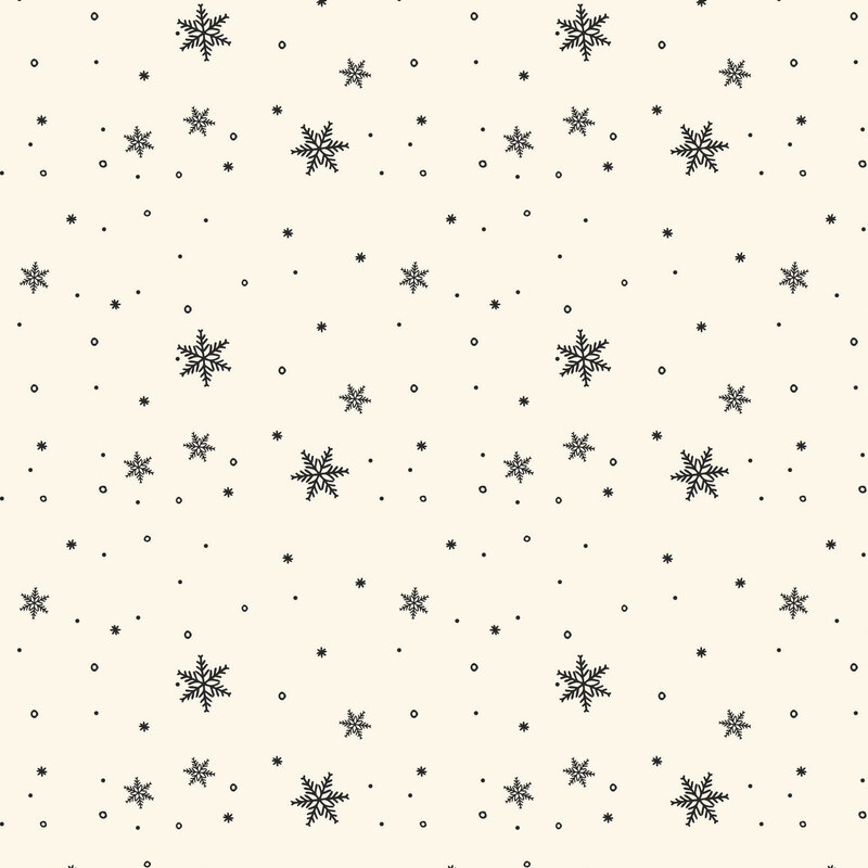 Cream fabric with a tossed design of black dots and snowflakes.