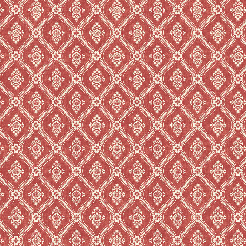 A crimson red fabric with white floral medallions framed by repeating ogee shapes.