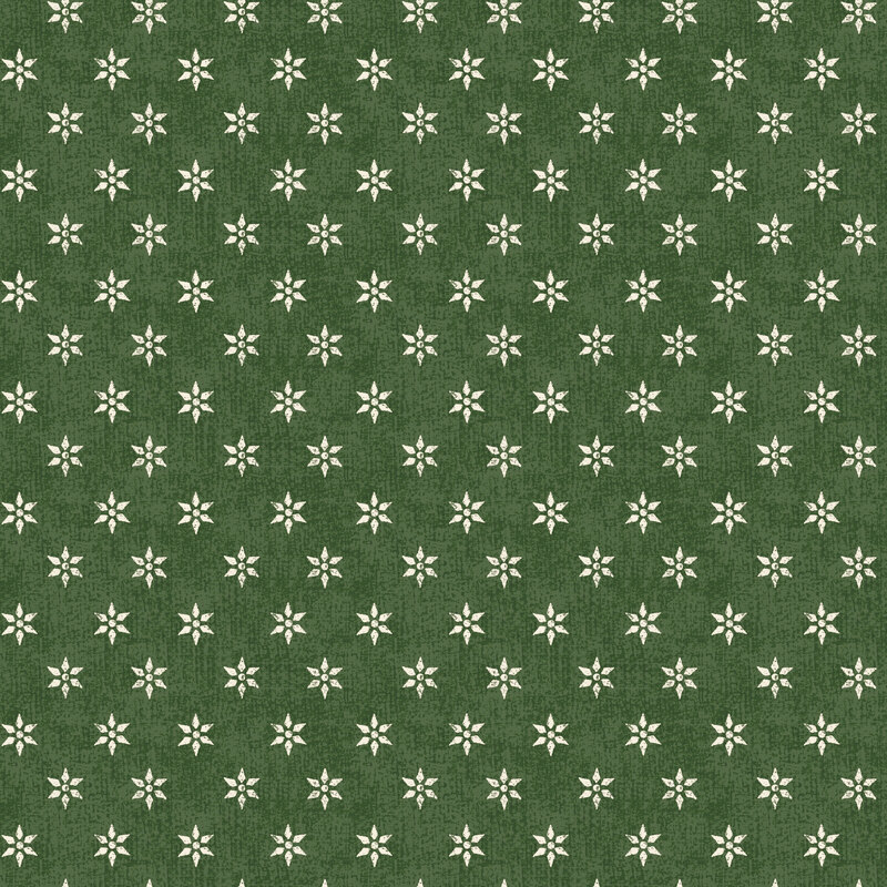 A forest green fabric with cream bowen stars.