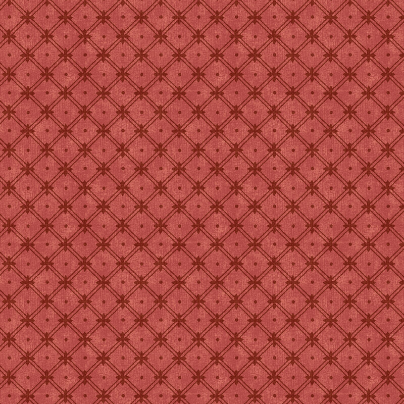 A spice red fabric with a dark red diamond lattice and small dots.