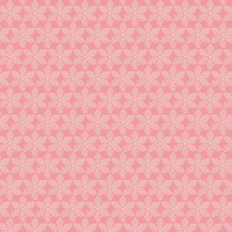 Soft pink fabric with a packed grid of white snowflakes.