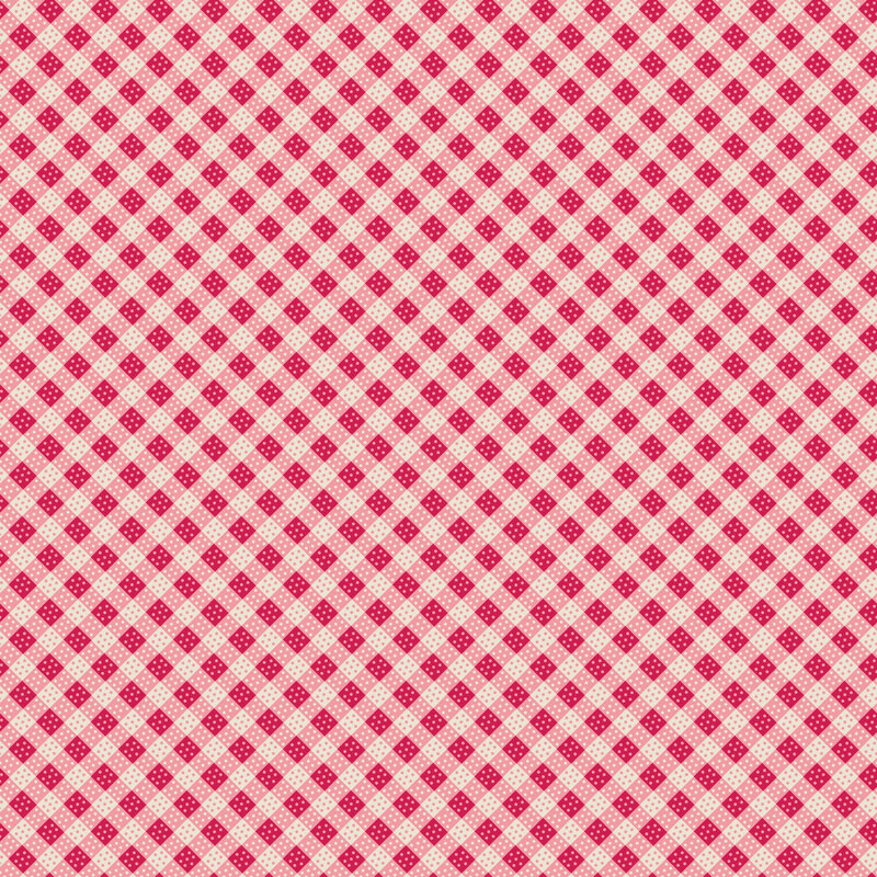 Bright and soft pink fabric with a dotted and biased gingham design.