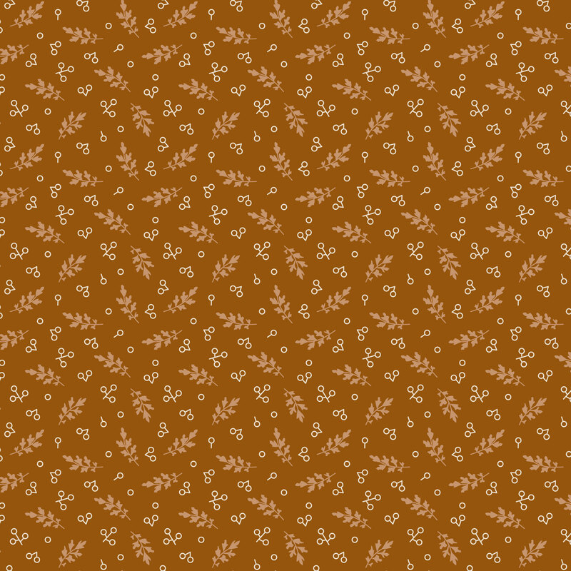 Warm brown fabric with a scattered pattern of nut-brown leaves and white circles.