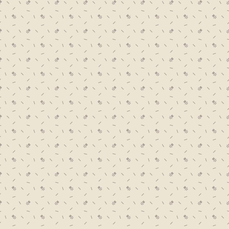 Cream fabric with a tossed pattern of gray primitive and geometric marks.