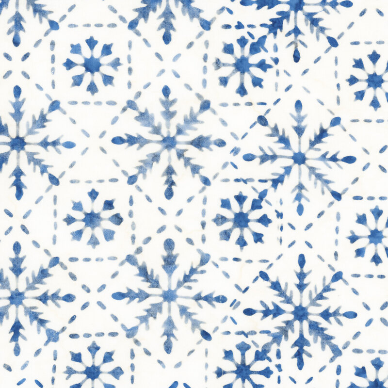 Mottled white batik fabric with a blue lattice pattern accented with snowflakes.