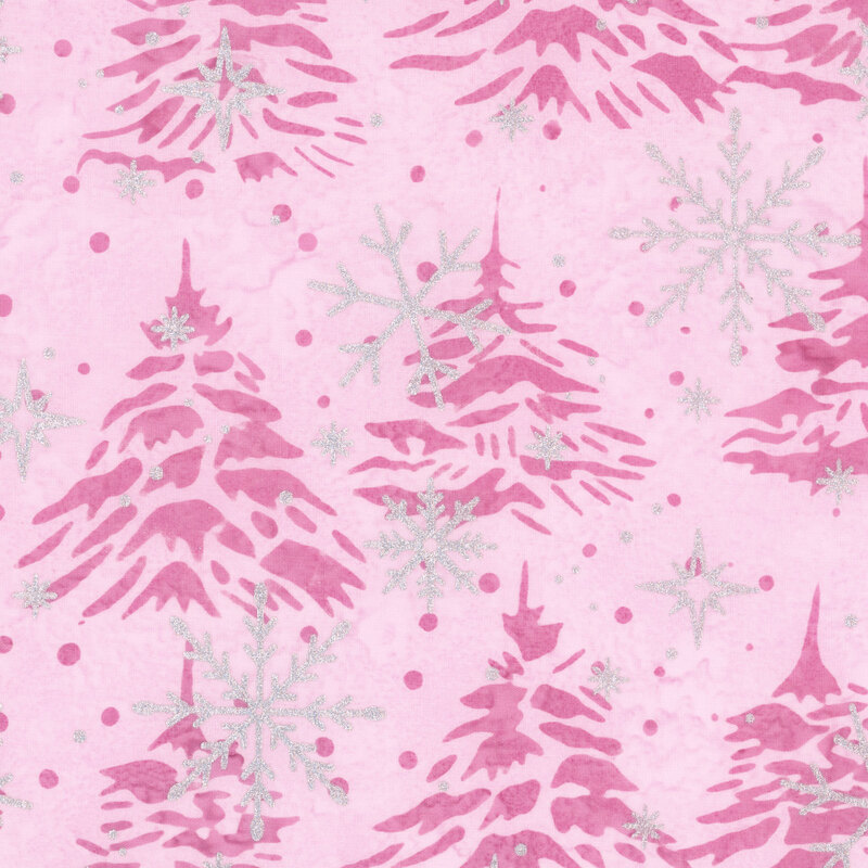 Mottled light pink batik fabric with a tossed pattern of pine trees accented with scattered metallic winter motifs.