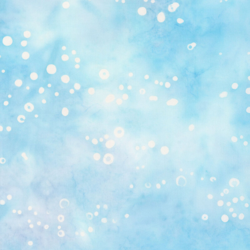 mottled sky blue fabric with white bubble accents.