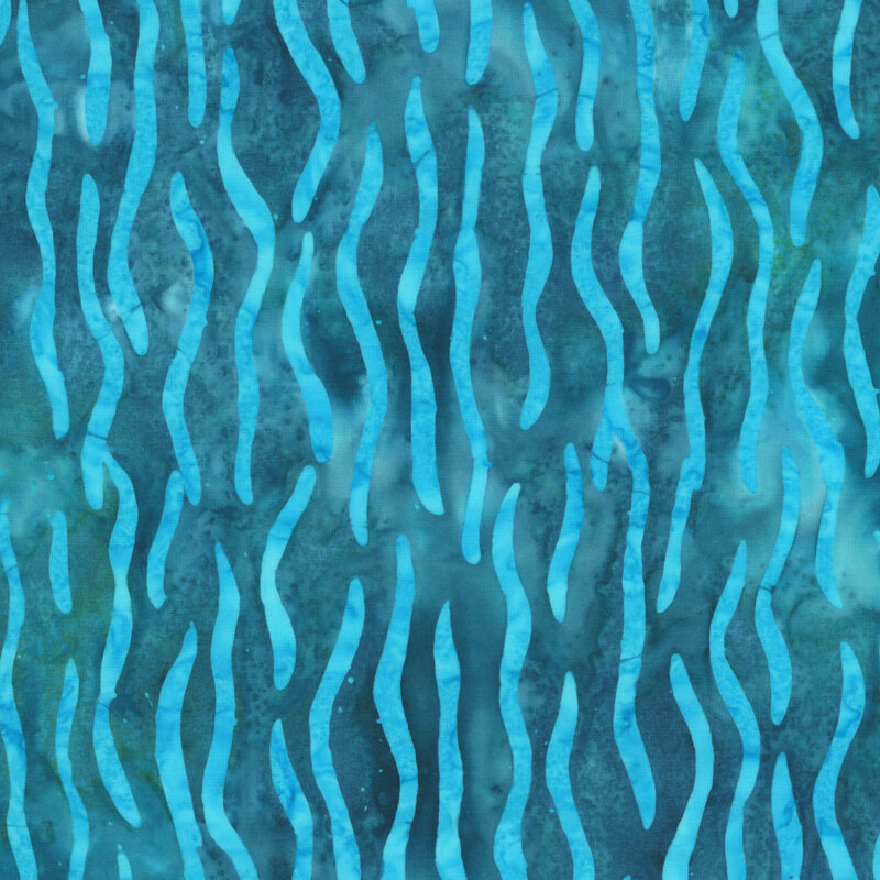 mottled teal blue fabric featuring wavy vertical lines in ocean blue