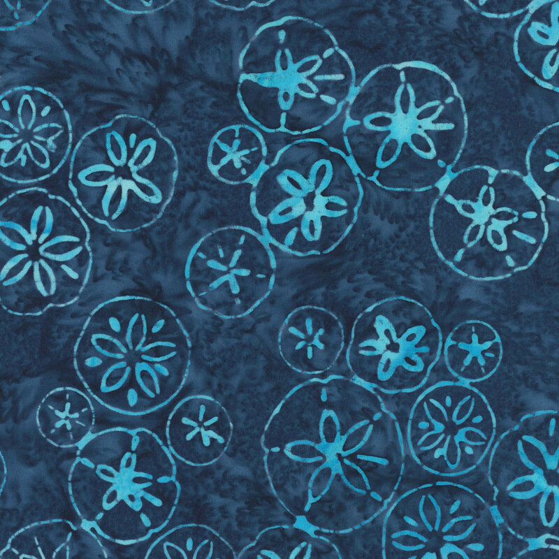 deep navy fabric featuring a mottled background accented with aqua blue sand dollars