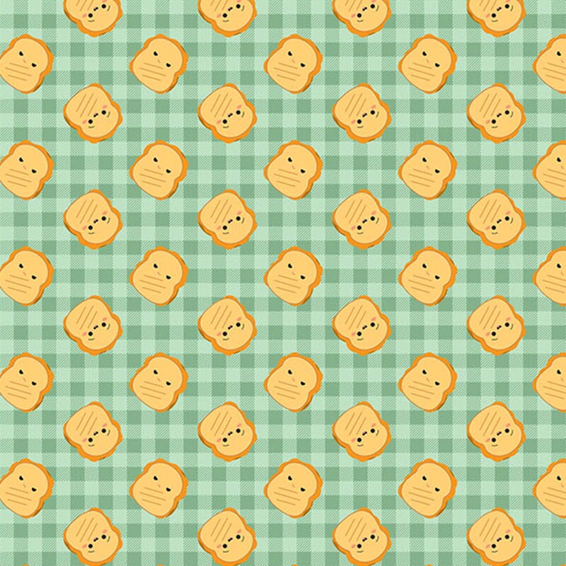Mint green plaid fabric with a tossed design of grilled cheese Squishmallows.