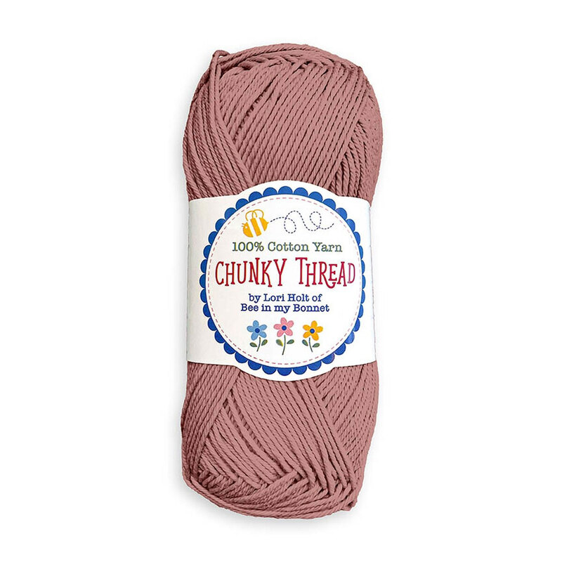 A skein of the Carnation Chunky Thread, isolated on a white background.