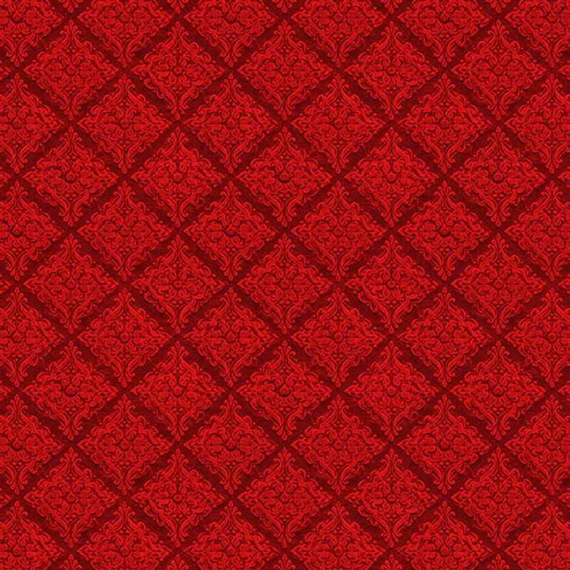 Red fabric with a tonal lattice pattern and ornamental Christmas motifs.