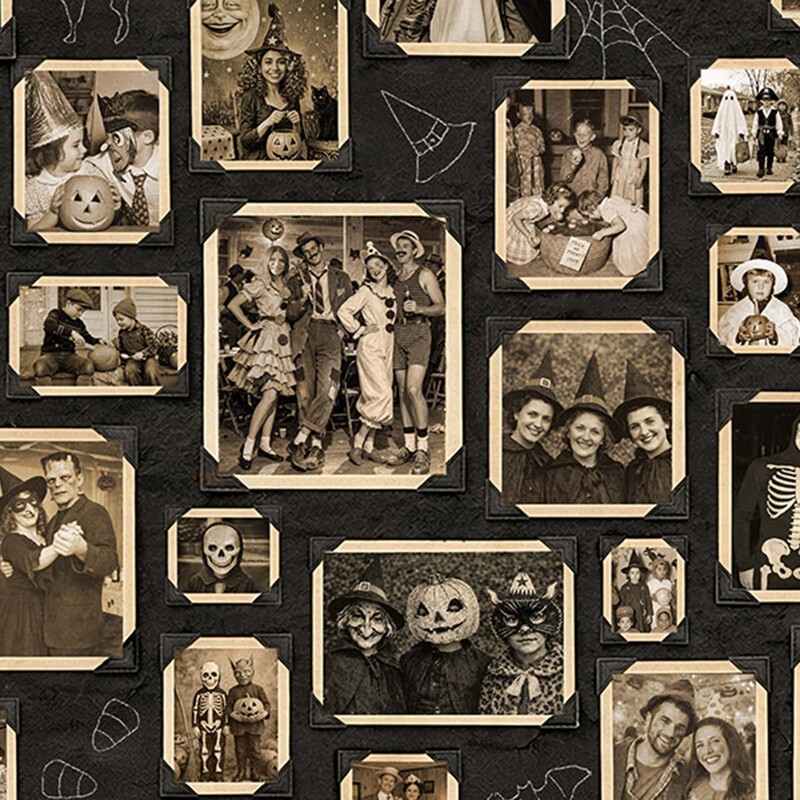 Black fabric with an album of vintage photography featuring trick or treaters in Halloween costumes.