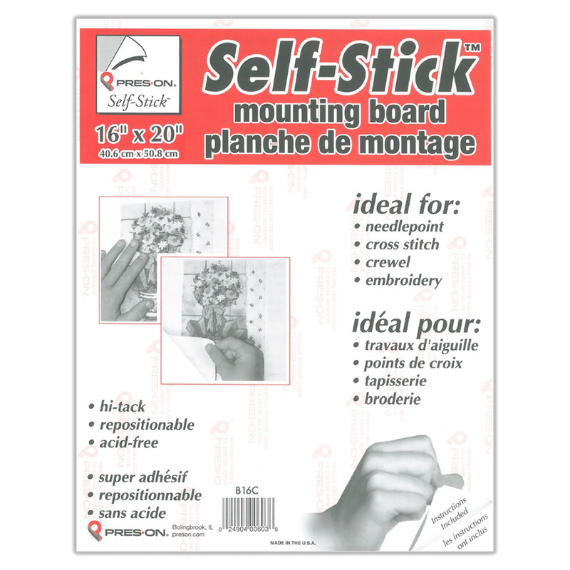 Rectangular self-adhesive chipboard panel for mounting and centering finished needlework before framing.