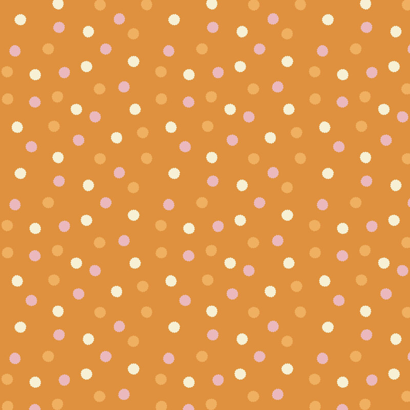 Dark marigold fabric with a scattered pattern of light orange, cream, and soft pink stylized dots.