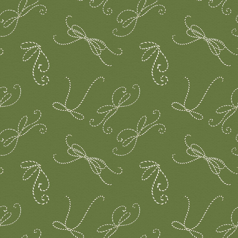 This sage green fabric features candy cane-striped twine tied into bows. 