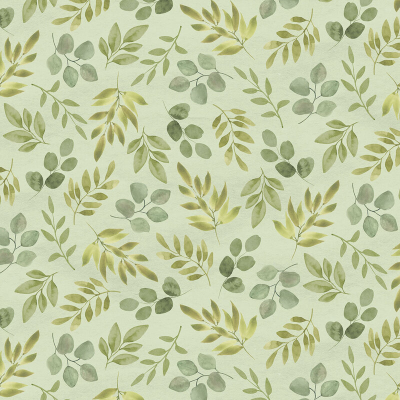 A warm sage fabric with scattered green leafy branches and sprigs featuring rounded and slender watercolor leaves.