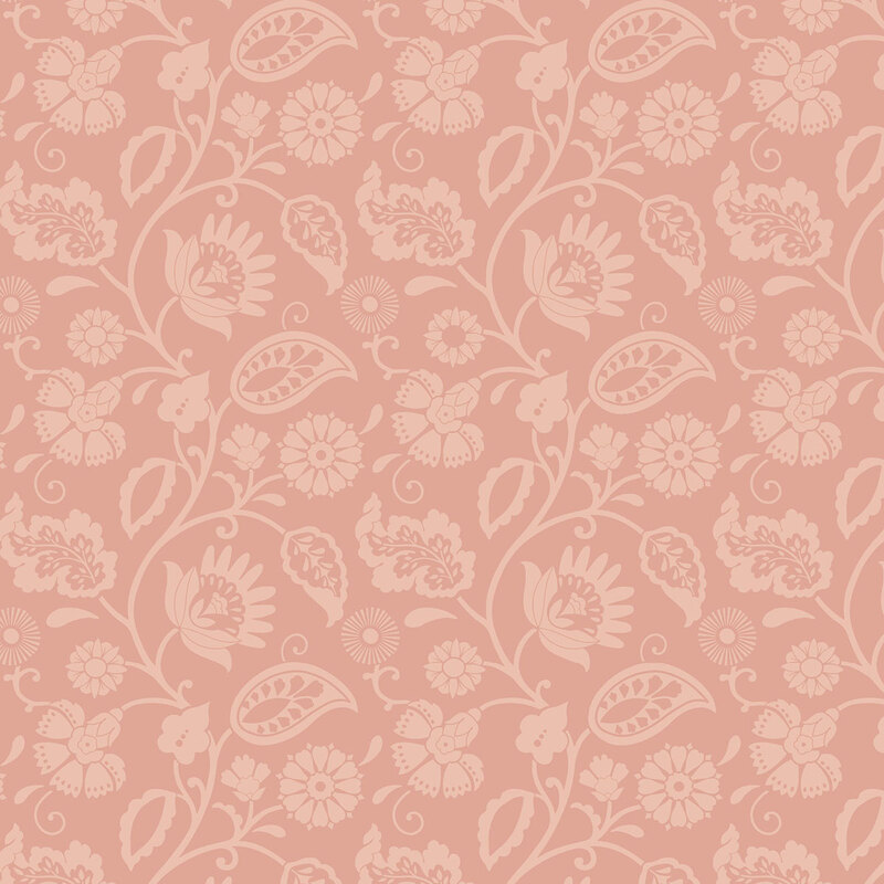 A dark peach fabric with light peach flowers, paisley shapes, and scrolling leafy vines.