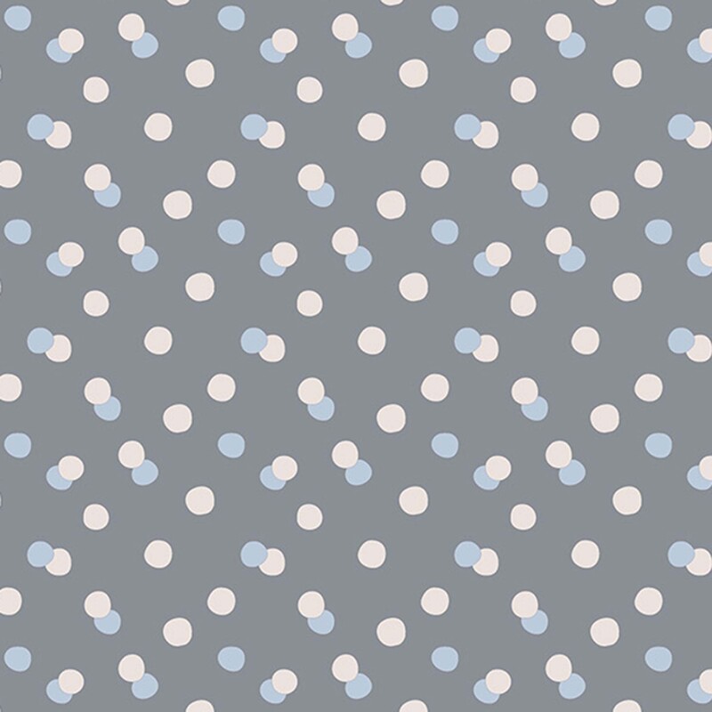 A gray fabric with scattered cream and light blue polka dots, some overlapping in pairs.