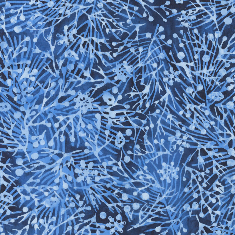 delicate pine branches, berries, and snowflakes in shades of icy blue and periwinkle against a richly mottled deep navy background.
