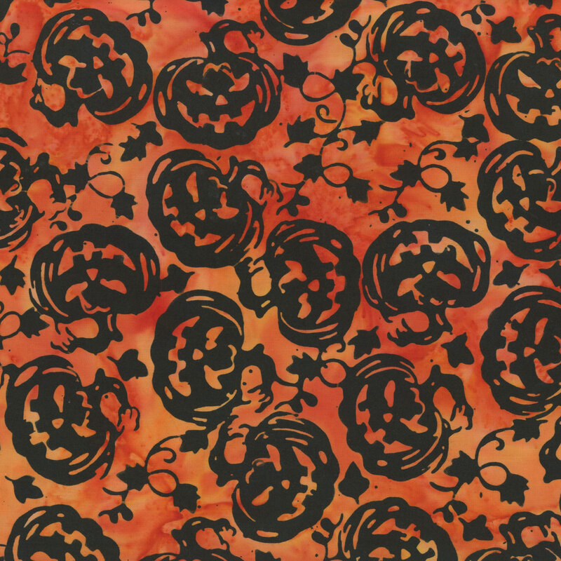 black jack-o-lanterns scattered across a mottled orange background.