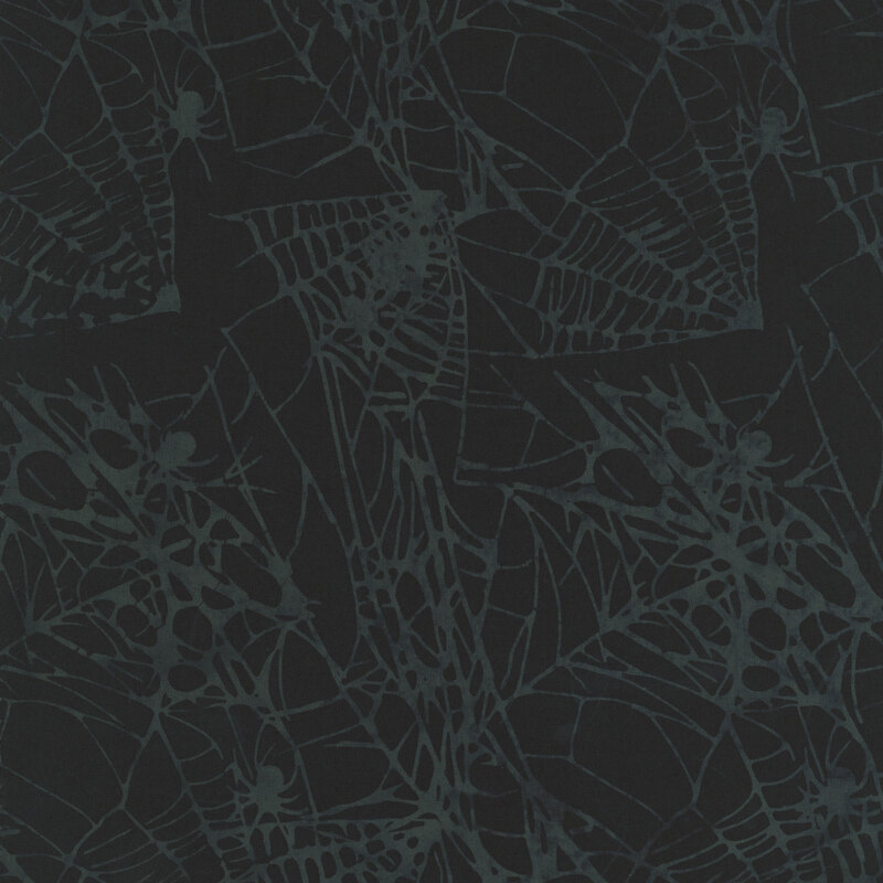 pewter grey spiderwebs with spiders on a black background.