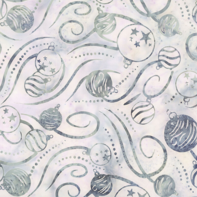 gray lavender mottled batik fabric featuring festive ornaments accented by dotted lines and swirling ribbons in gray hues.