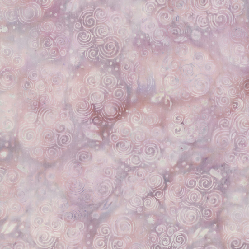 dusty mauve mottled batik fabric featuring clusters of swirls, dots, snowflakes, holly leaves in soft icy blue and gray hues.
