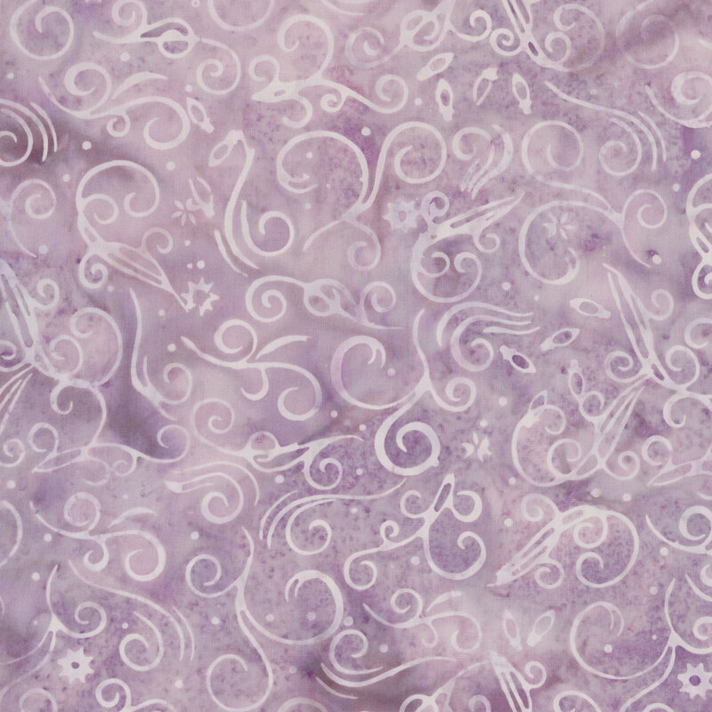 swirls, dots, snowflakes and stars scattered across a mottled thistle background.