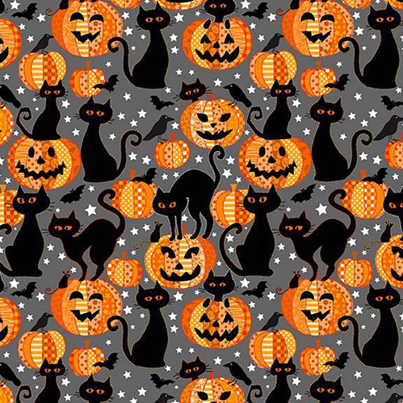 Slate gray fabric with a scattered design of Halloween motifs like jack-o'-lanterns, bats, black cats, crows, and stars.