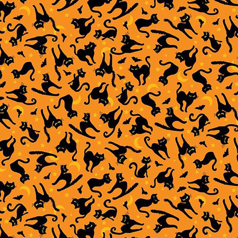 Pumpkin orange fabric with a tossed design of stars, moons, black cats, and bats.