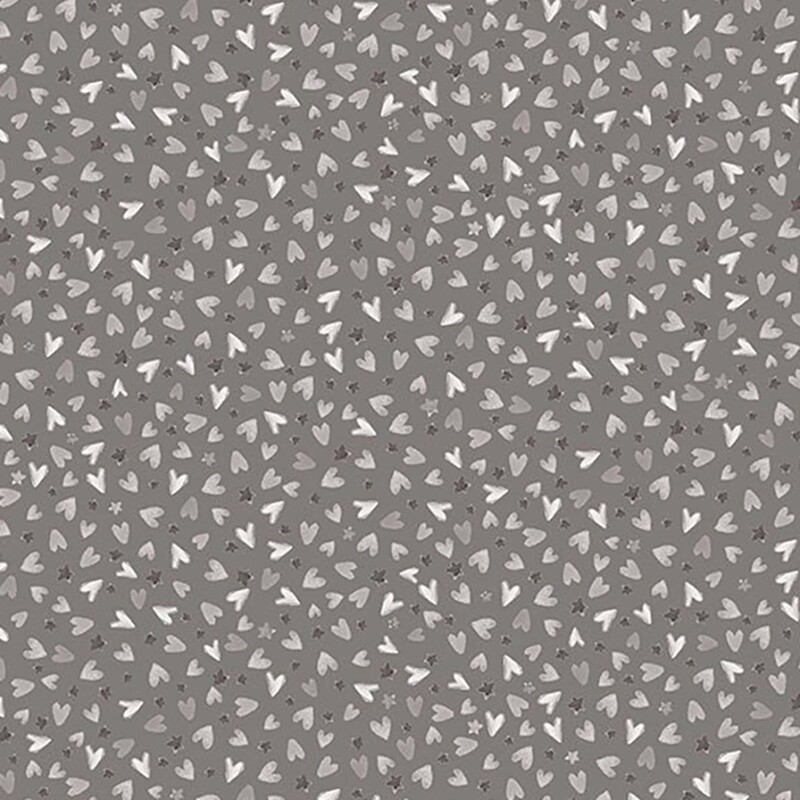 Fabric filled with a packed, tossed design of achromatic hearts and stars on a gray background.