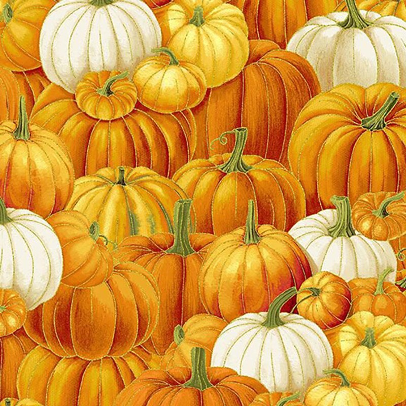 Orange fabric layered pumpkins in classic orange, gold, and white colorways accented by golden metallics.