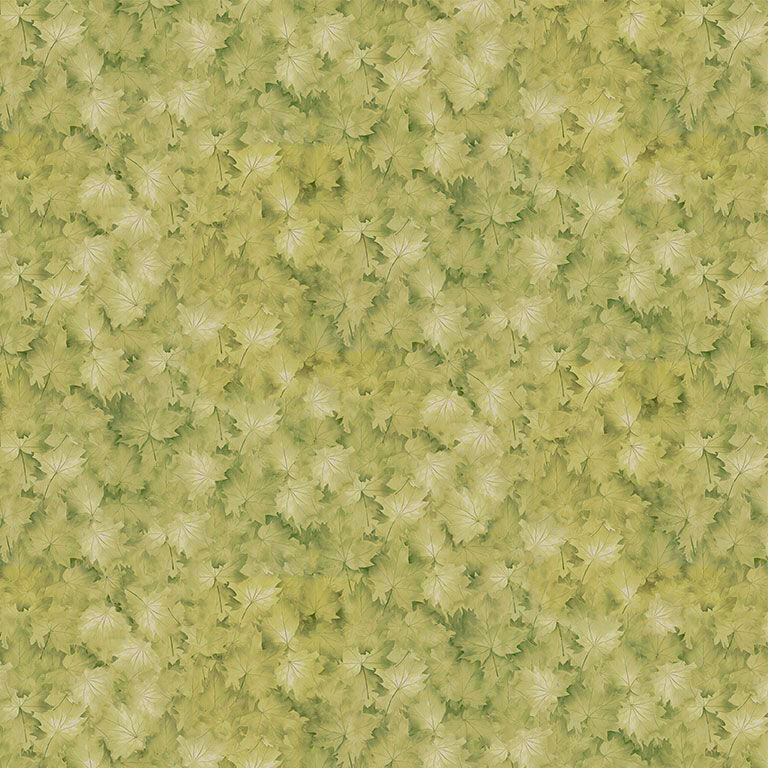 Tonal, autumnal fabric with a packed design of fern green maple leaves.