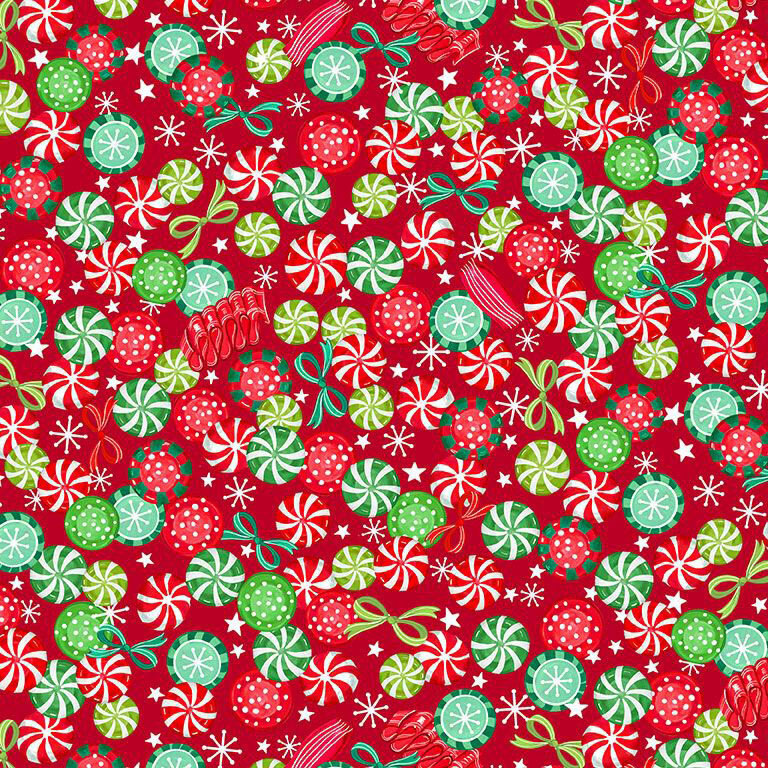 Christmas red fabric with a packed, tossed pattern of stars, bows, and assorted sweets.