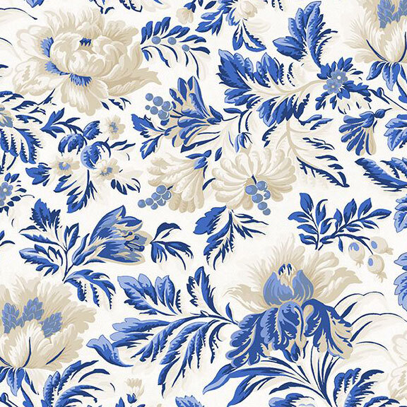 White fabric with blue and white florals and leaves.