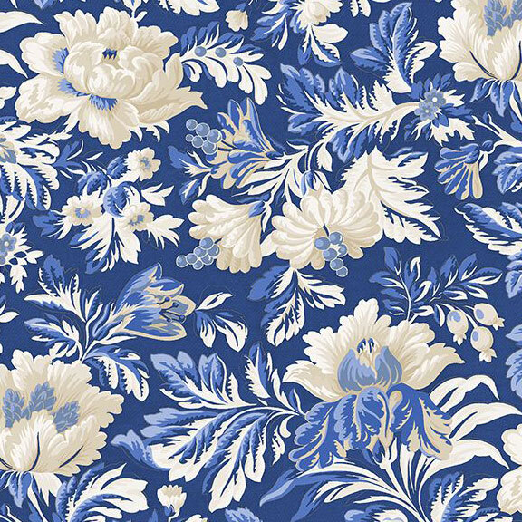 Dark blue fabric with blue and white florals and leaves.