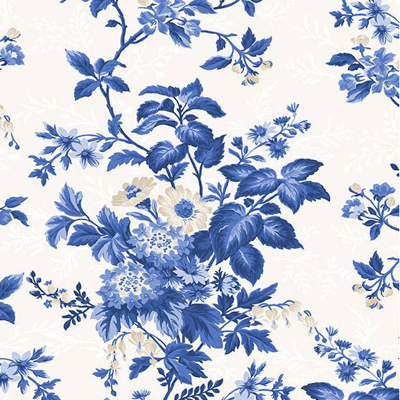 Cream fabric with blue and white florals and leaves.