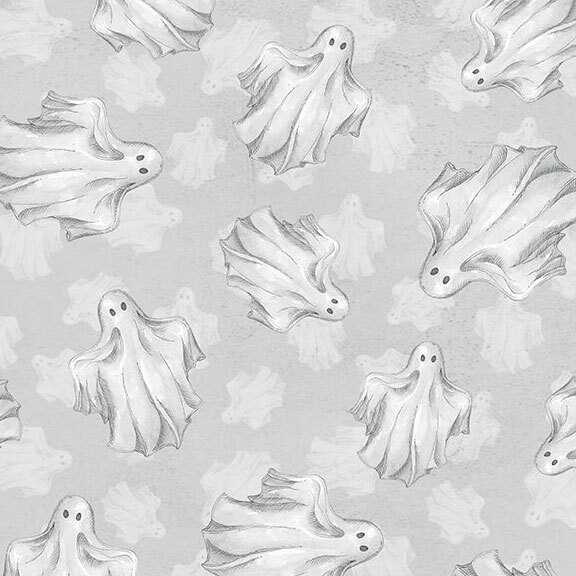 Textured smoke gray fabric with a faded pattern of small tossed ghosts topped with a larger tossed pattern of stylized ghosts.