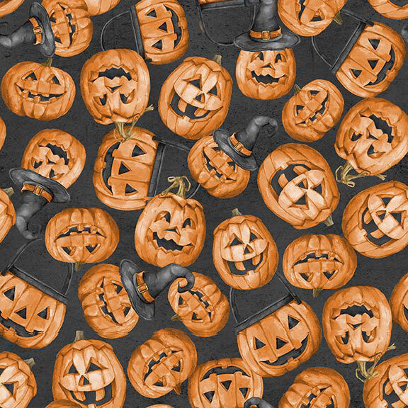 Textured, soft black fabric with a tossed pattern of jack-o'-lanterns topped with handles and witch hats.