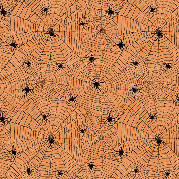 Textured pumpkin orange fabric with a packed design of black spiderwebs and spiders crawling on top.