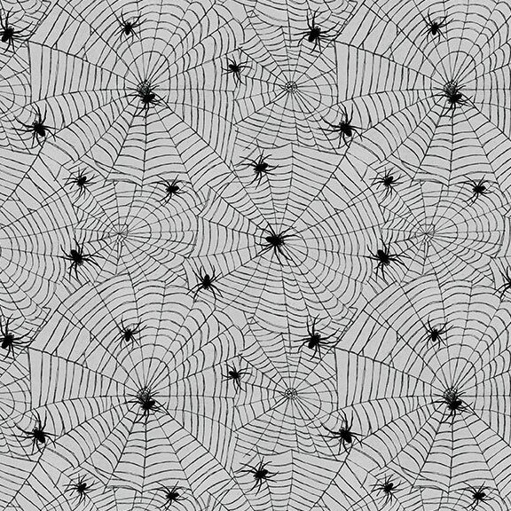 Textured smoke gray fabric with a packed design of black spiderwebs and spiders crawling on top.