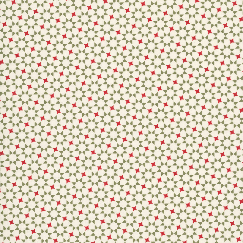 repeating green and red geometric star pattern on a cream fabric.