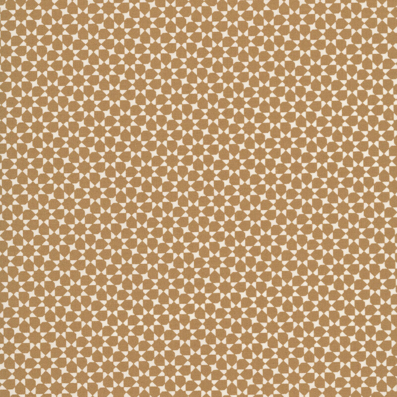 repeating white geometric star pattern on a tan fabric.