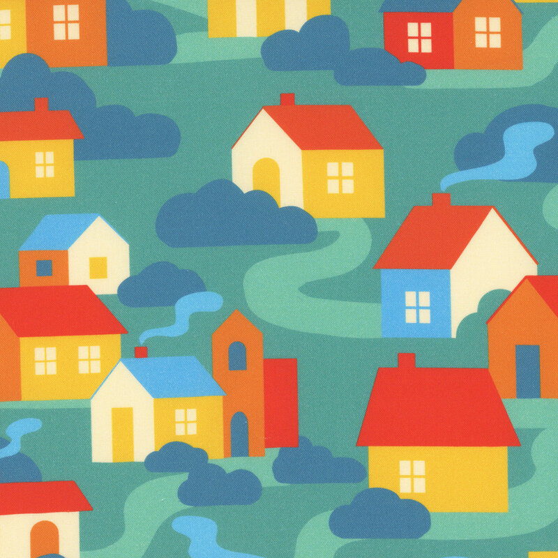 A turquoise fabric with colorful houses, rounded shrubs, and winding paths.