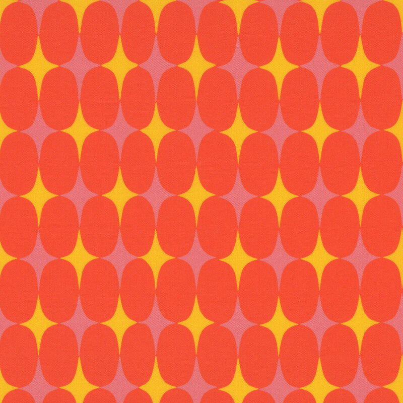 A traffic cone orange fabric with ovals and pink and yellow sparkle accents.