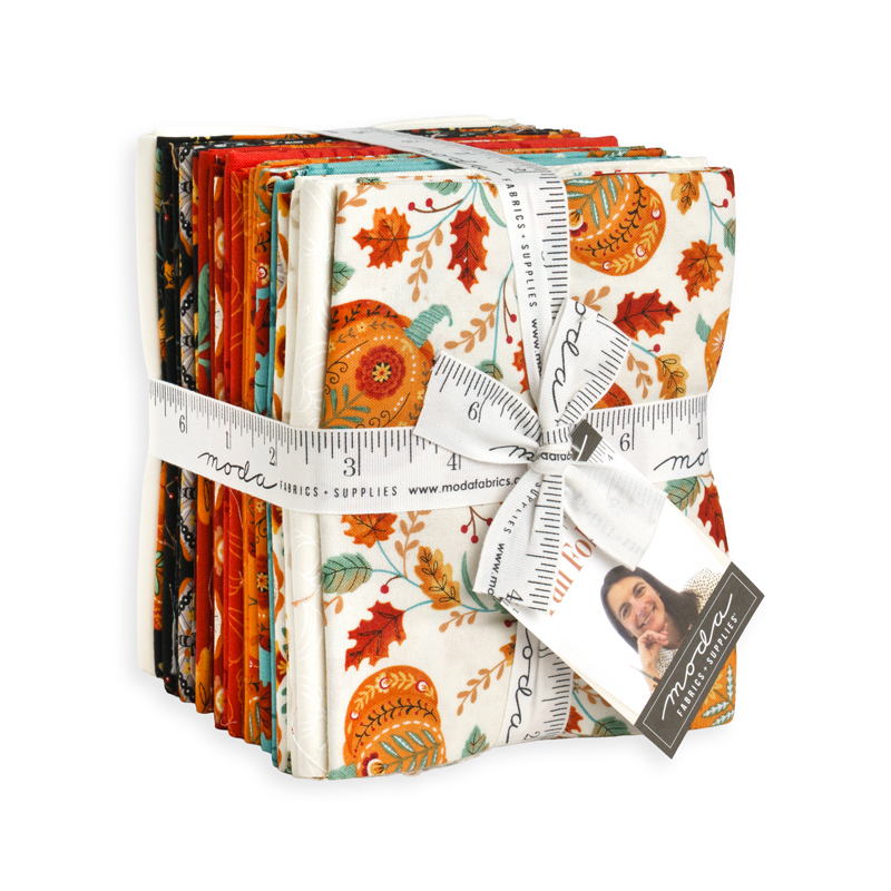 The Fall Folktale Fat Quarter Bundle in its packaging, isolated on a white background. 