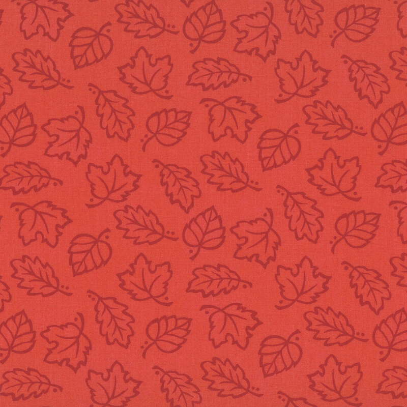 A red fabric with scattered falling leaves.